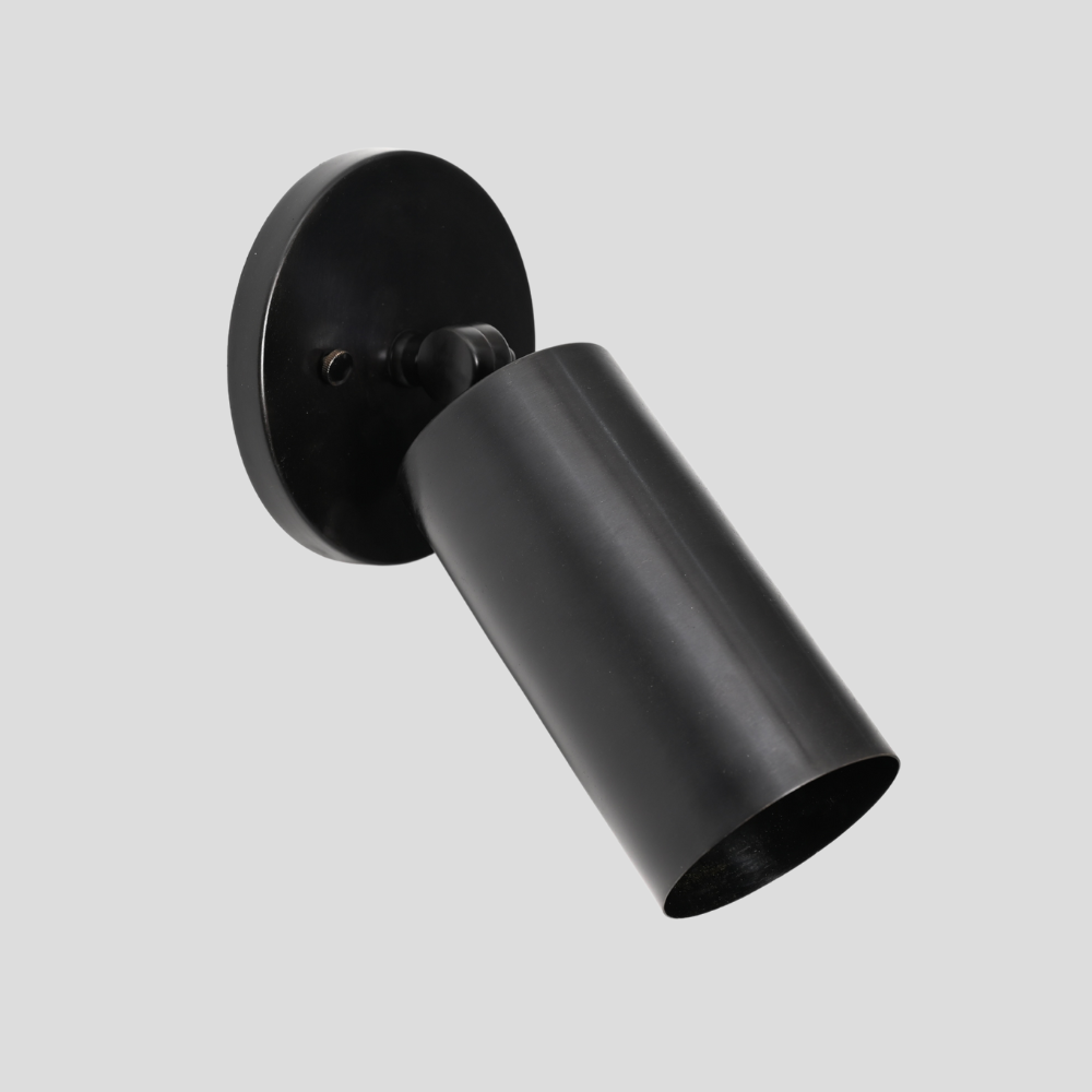 Modern Antique Black wall lamp fixture on a gray background