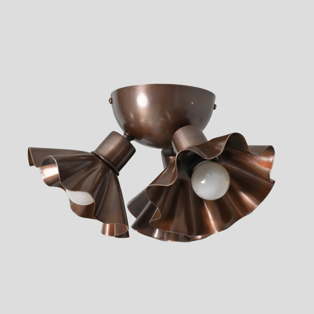 Antique brass Copper ceiling light fixture on a gray background