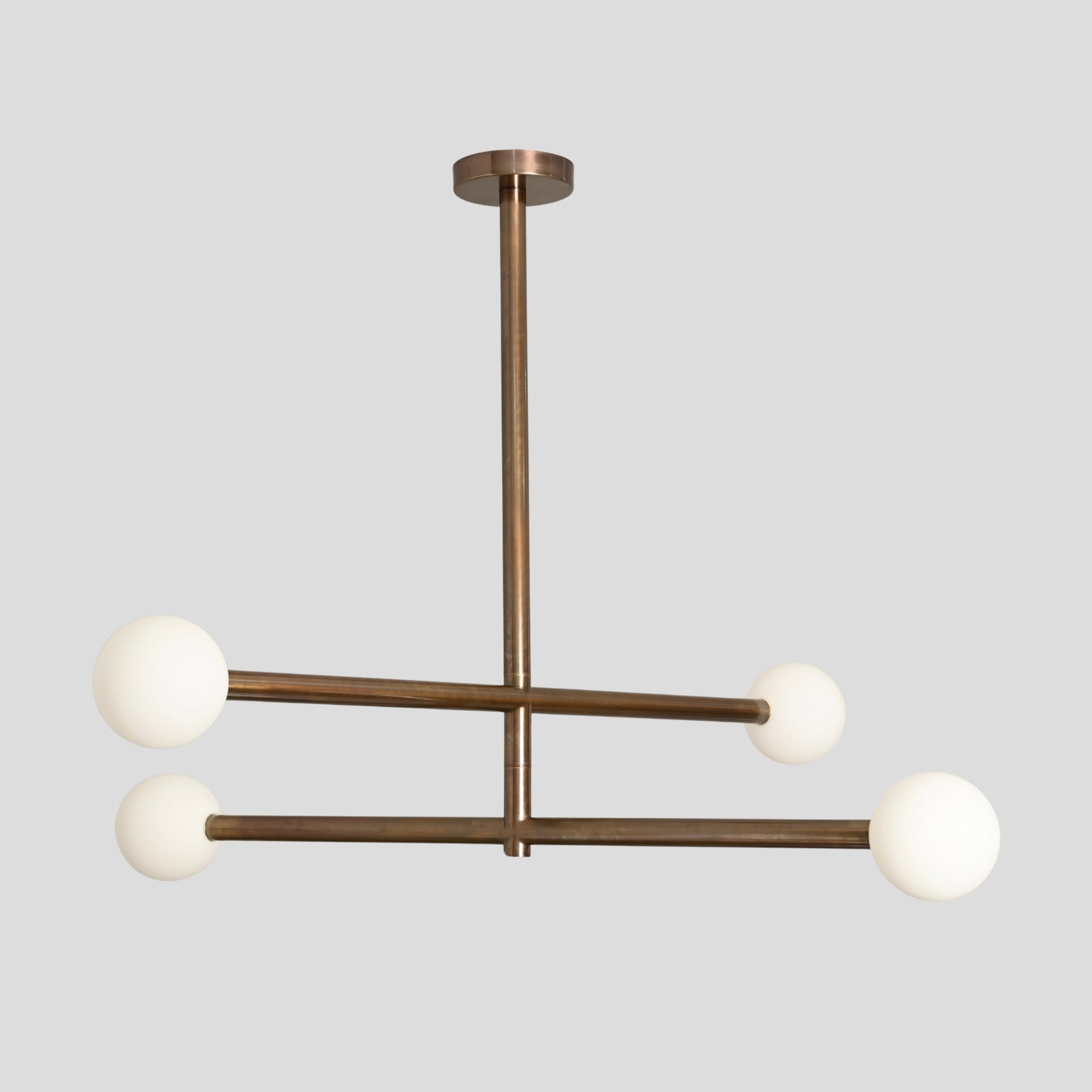 Mid century modern ceiling light with 4 frosted glass globe, a pure brass sputnik chandelier designed by LightCove