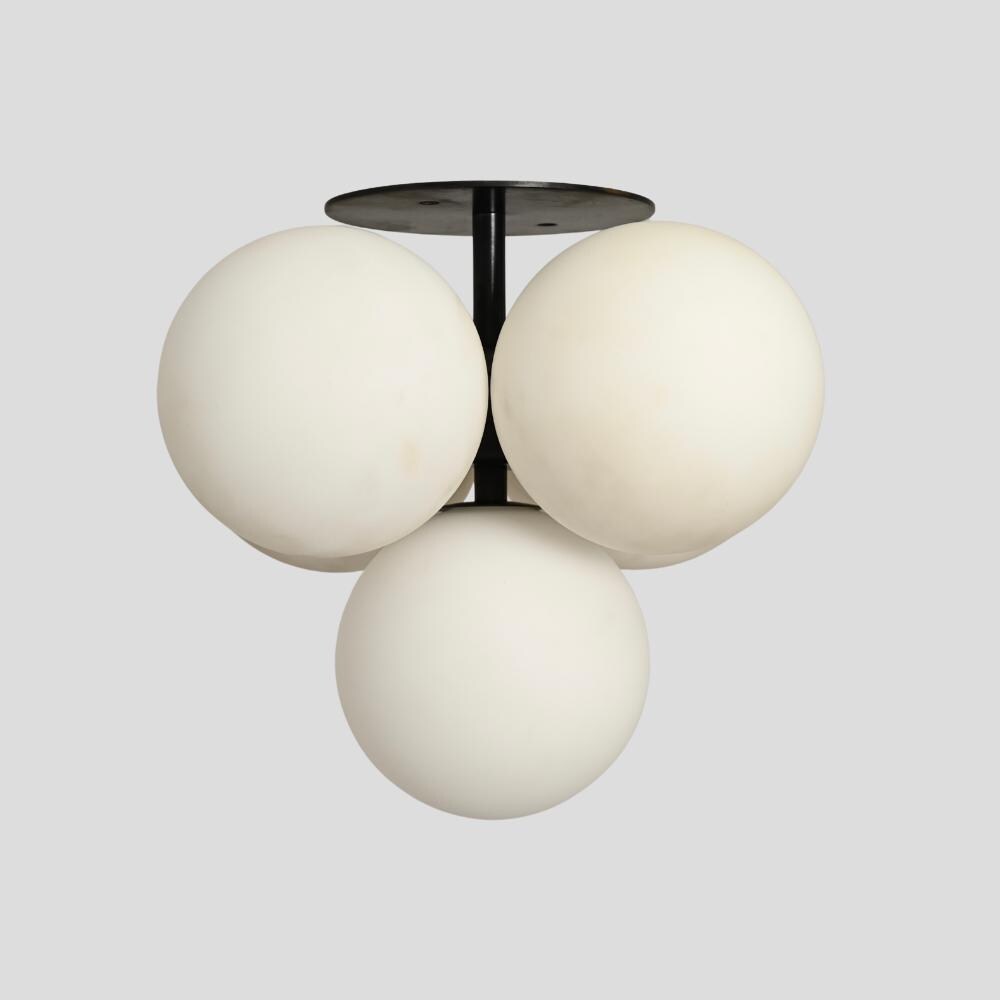 modern brass flush mount with five frosted glass globe on a gray background
