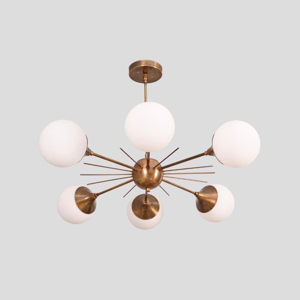 a handcrafted modern mid century sputnik chandelier with 6 arm with a pure antique brass finish
