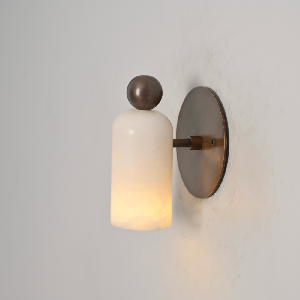 Brass Ball Marble alabaster wall lamp on a gray wall