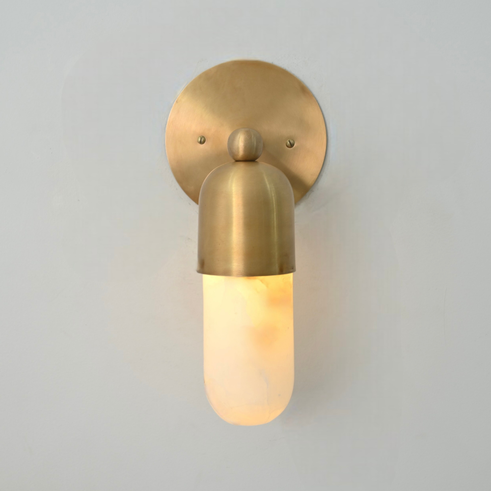Modern marble wall sconce with warm ambient glow