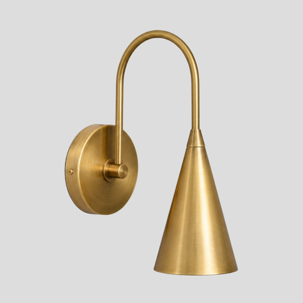 Brass Trumpet Long Cone Wall Lamp – Mid Century Curved Gooseneck Sconce with raw brass finish, curved arc arm, and tapered trumpet shade