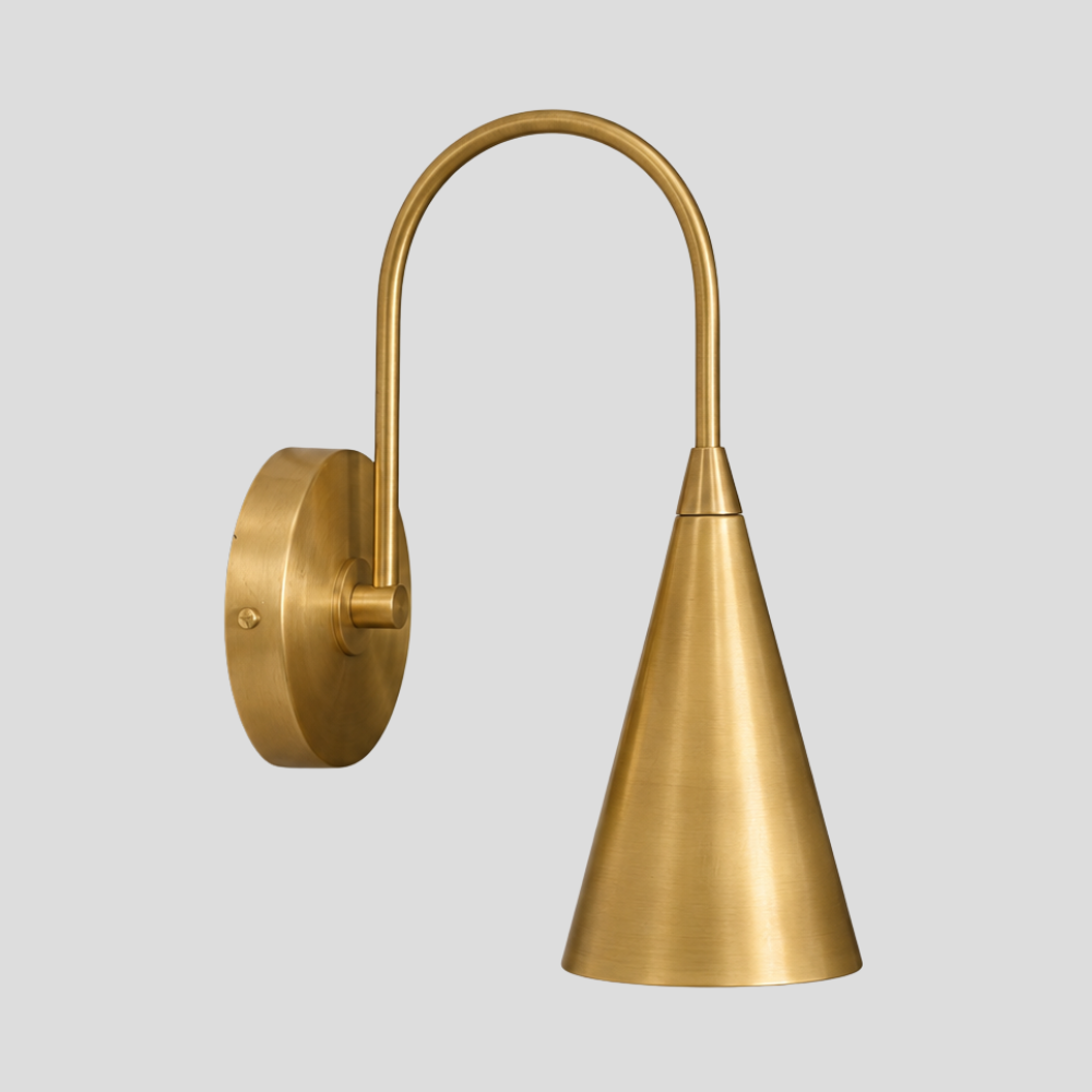 Brass Trumpet Long Cone Wall Lamp – Mid Century Curved Gooseneck Sconce with raw brass finish, curved arc arm, and tapered trumpet shade