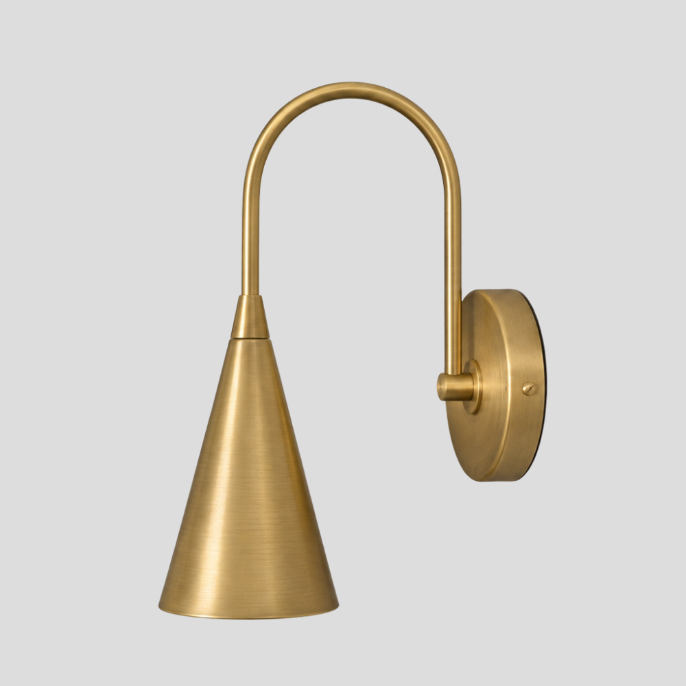 Brass Trumpet Long Cone Wall Lamp – Mid Century Curved Gooseneck Sconce with raw brass finish, curved arc arm, and tapered trumpet shade