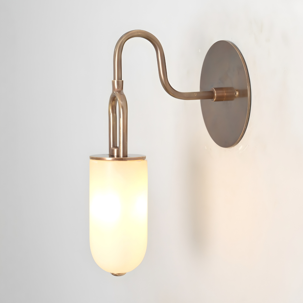 Minimalist brass wall lamp with sculptural curved arm