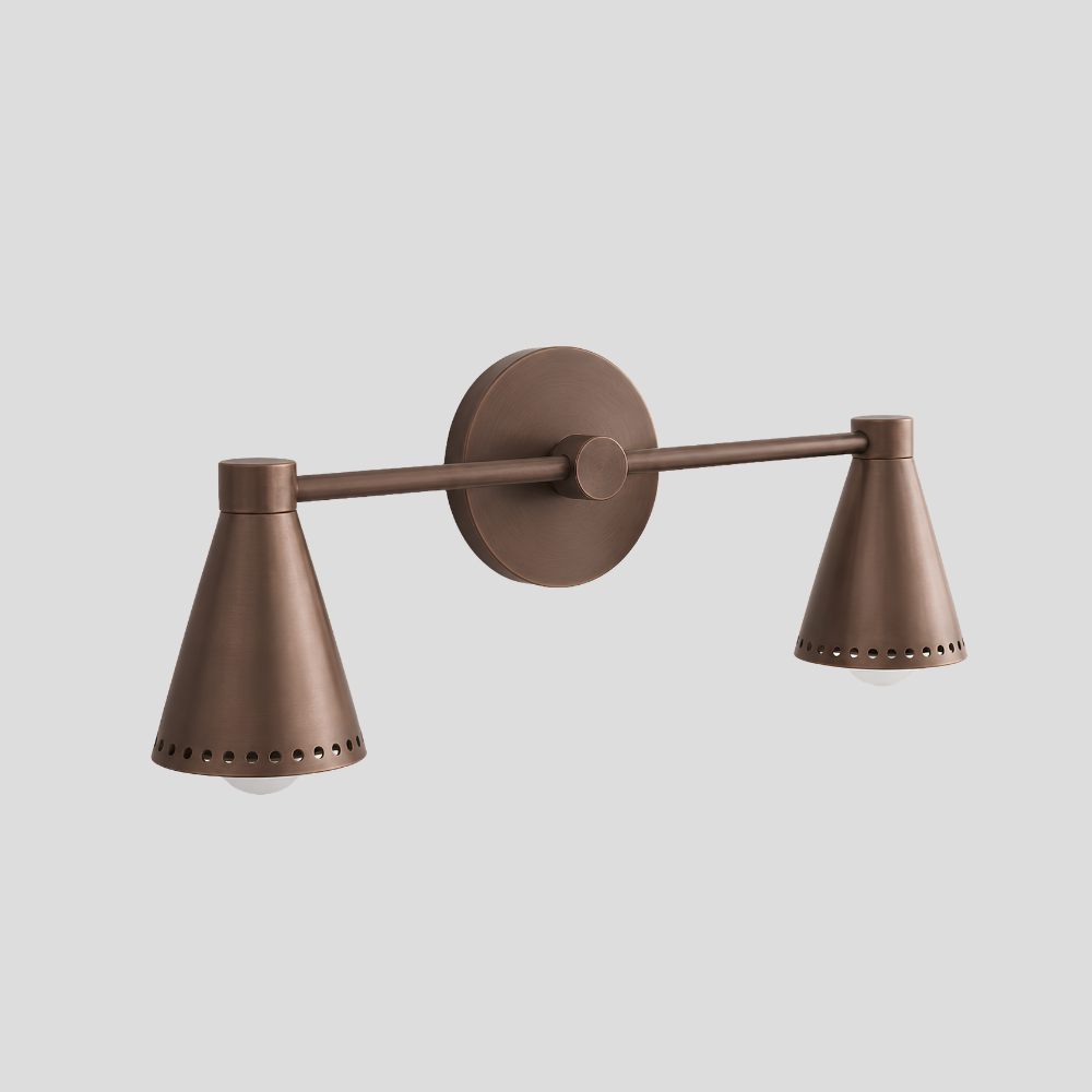Double Perforated Brass Cone Sconce - Mid Century Vanity Light with horizontal bar arm, dual perforated cone shades, and round wall mount base.