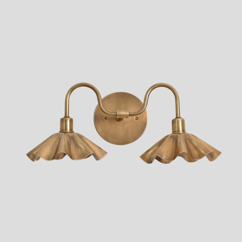 mid century brass wall light with floral petal shades
