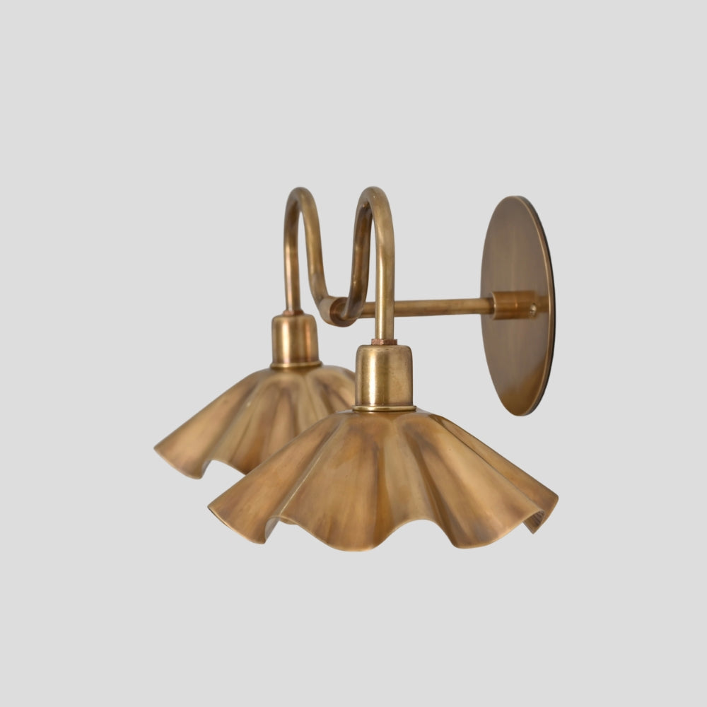 brass wall sconce providing warm ambient lighting