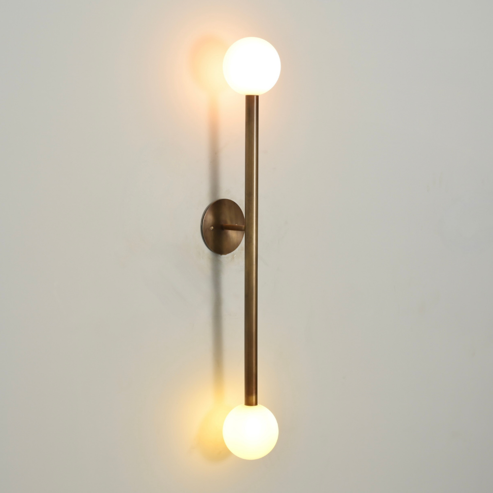 Vintage light handcrafted by lightcove with a brass vertical arm