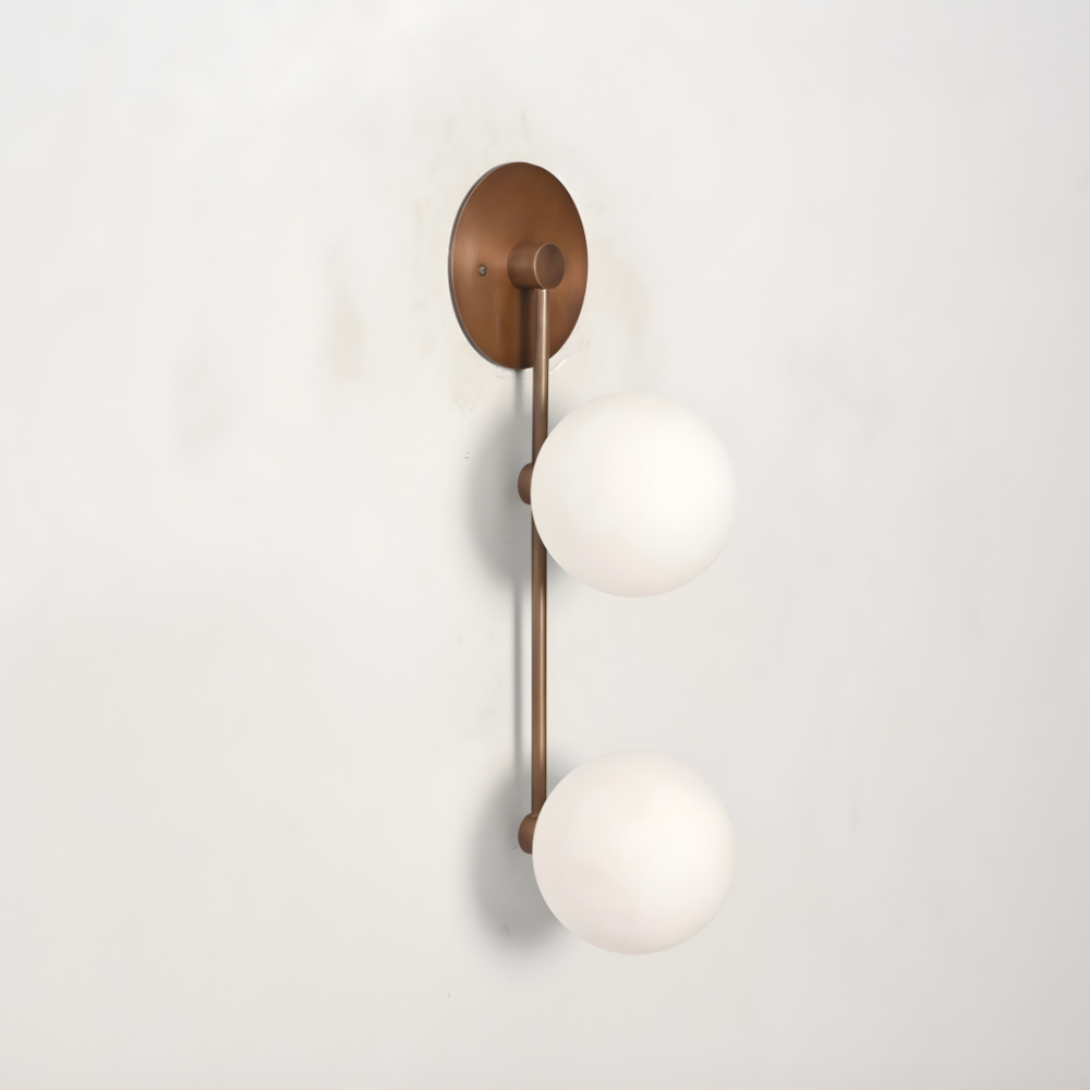 Vintage wall lamp designed with a double brass globe handcrafted by LightCove