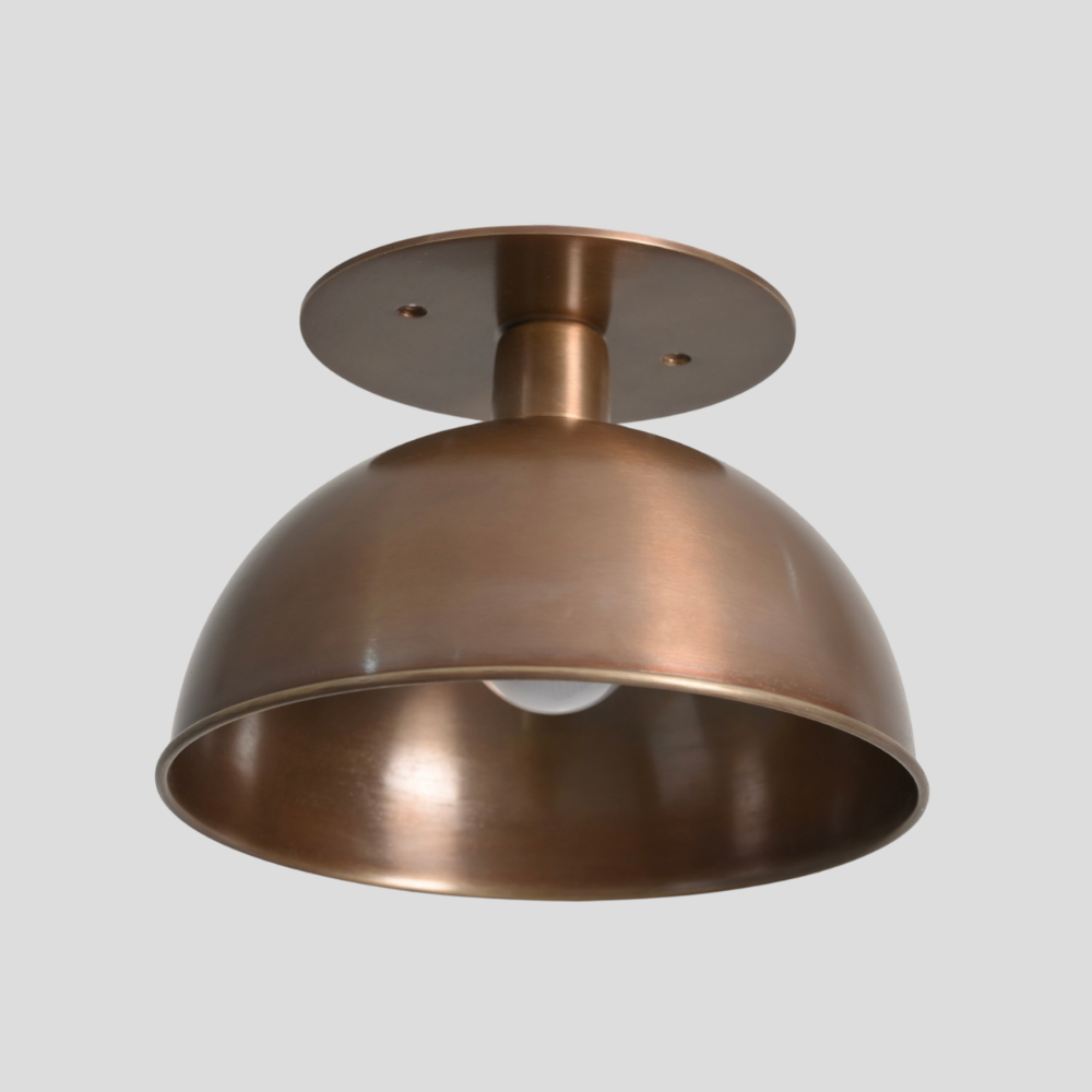 Antique brass flush mount with a cut shade handmade by LightCove