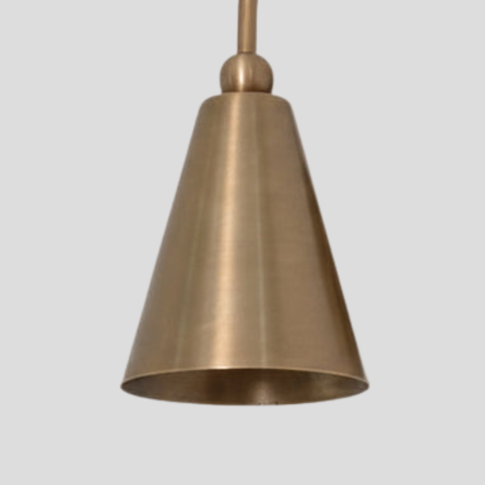 Close-up of Modern Brass Cone Shade Sconce - Curved Gooseneck Wall Light showing arm, tapered cone shade, and ball joint detail