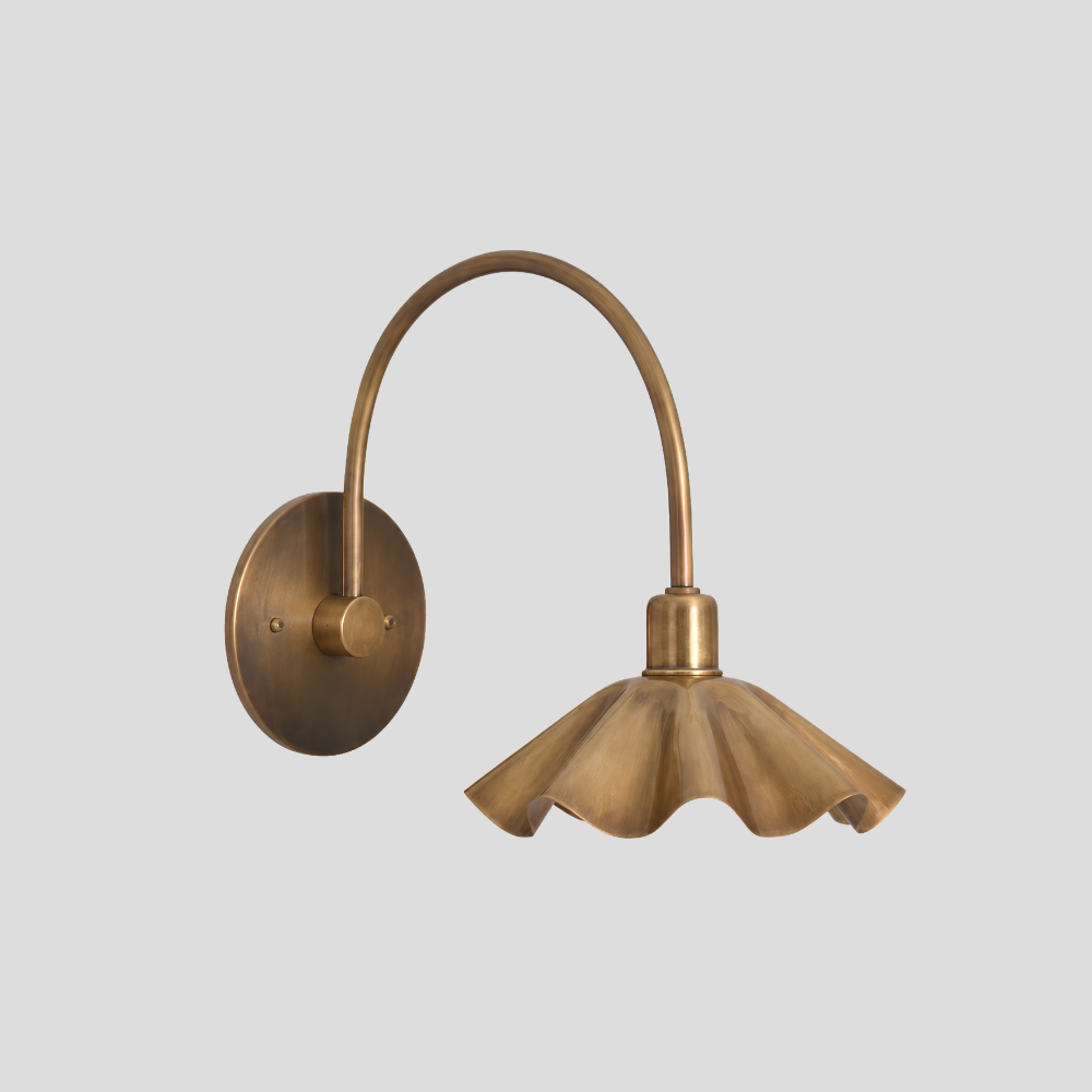Modern Brass Ruffled Petal Shade Wall Lamp - Curved Flower Gooseneck Sconce with tall arc arm, petal shade, ruffles, and flower-inspired design