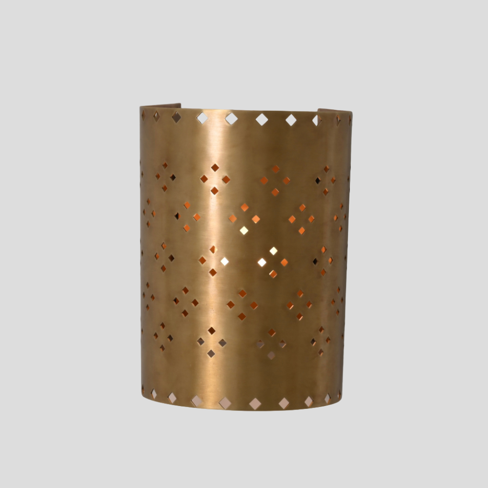 Perforated Cylinder Brass Sconce - Geometric Cut Diamond Wall Lamp with cylindrical brass shade, diamond cutout pattern, and perforated design