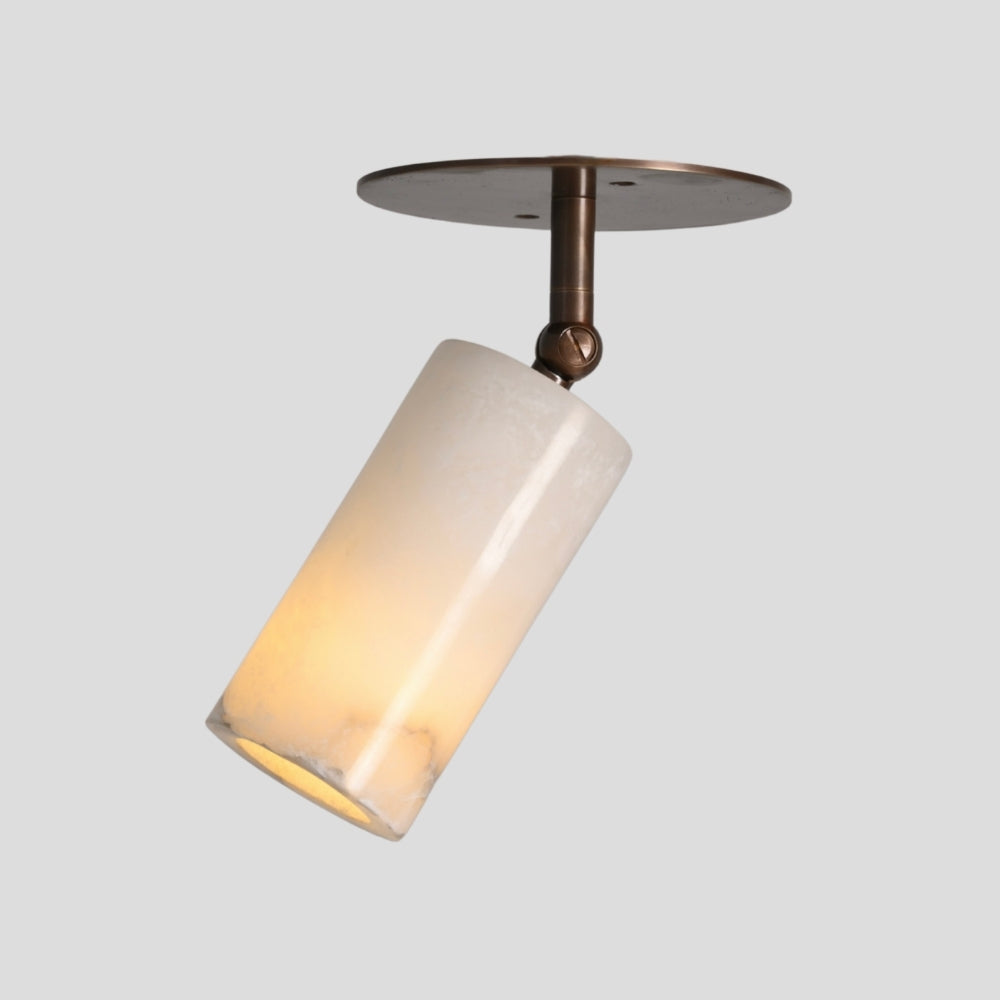 Ceiling light fixture with white glass shade on a gray background