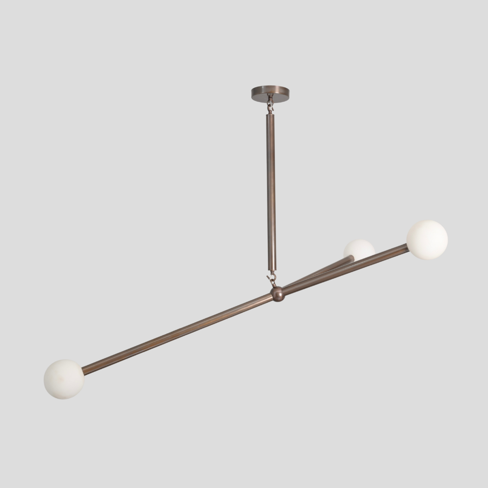 Minimalist 3 frosted glass globe handcrafted with a rod in a pure antique brass finish