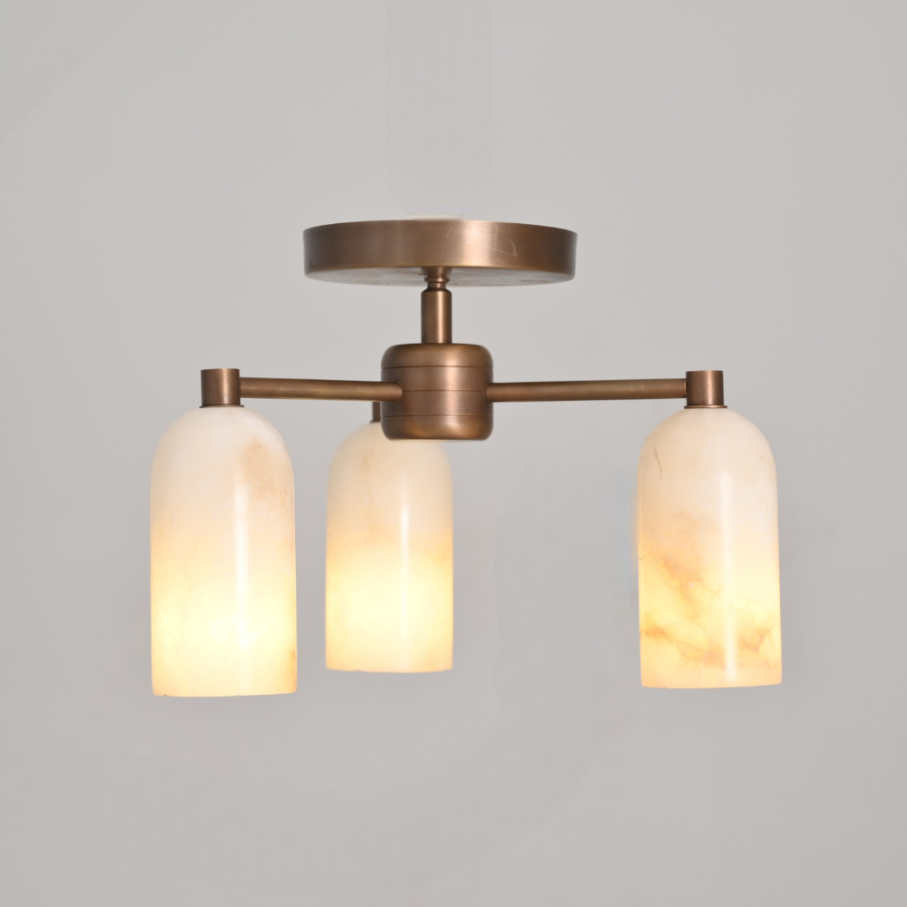 Three light alabaster ceiling fixture in brass finish