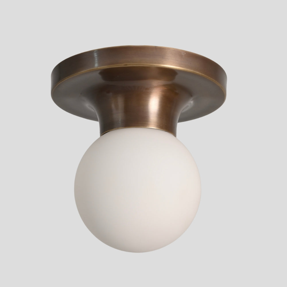 mid century brass globe flush mount ceiling light with opal glass