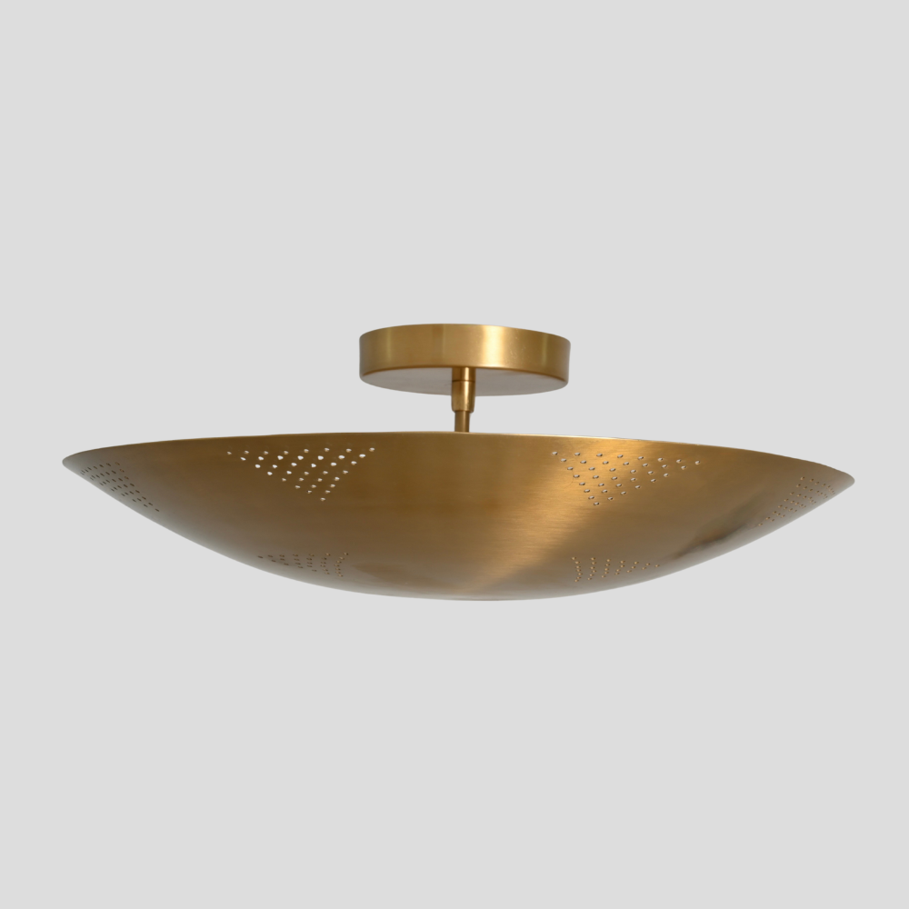 Gold ceiling light fixture on a gray background