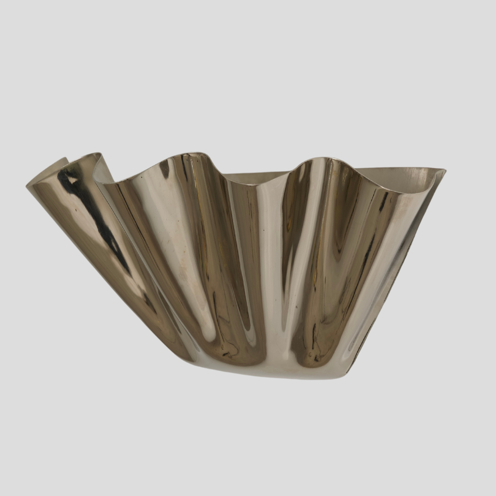 handmade modern half flower wall sconce on a grey background. 