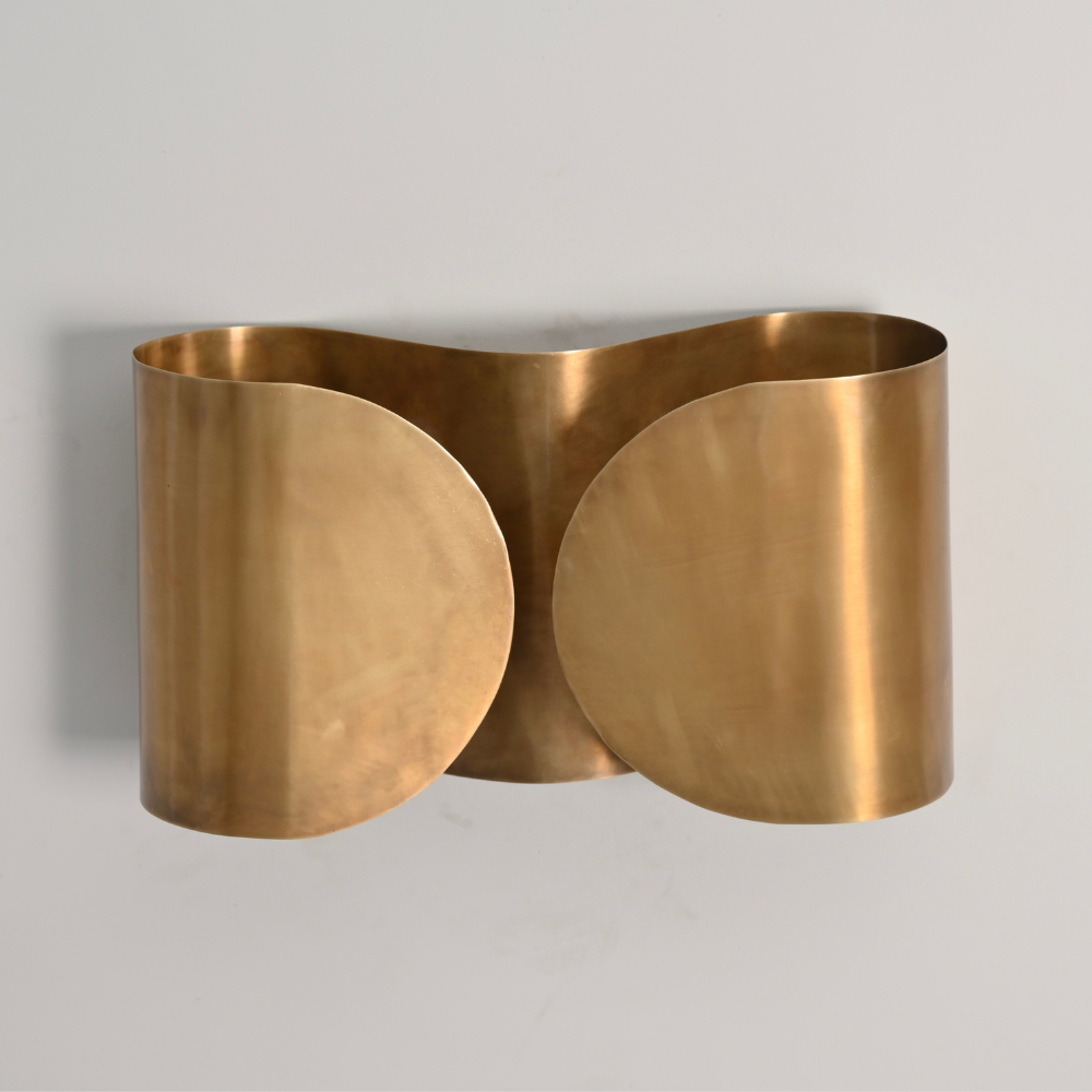 raw brass shade on a light gray background