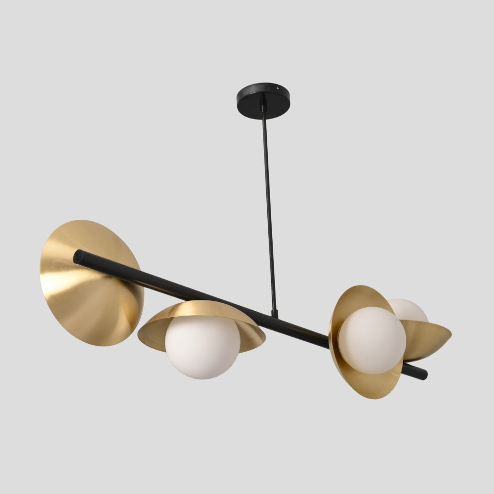 Multiple brass glass globe on a black rod and curved brass shade chandelier