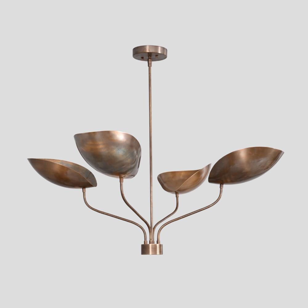Brass sputnik chandelier with two curved arm on a gray background