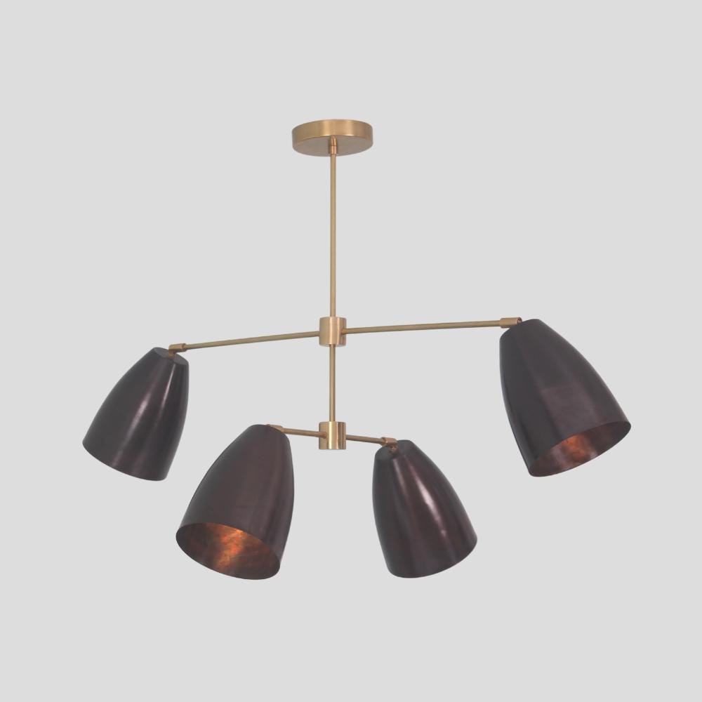 Adjustable sputnik chandelier mixing matt black and raw brass finish on a gray background, handmade lighting by LightCove 
