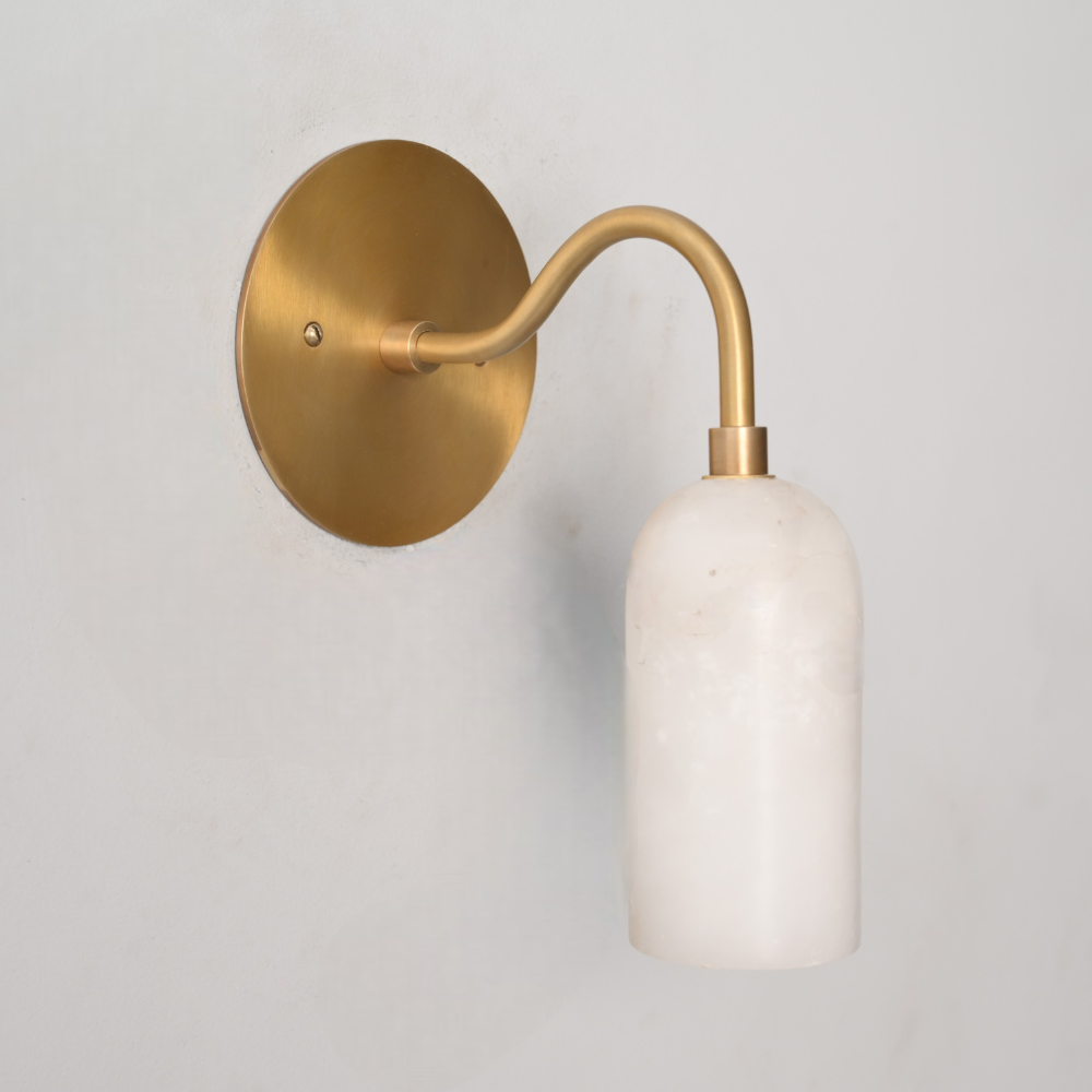 Mid century modern marble wall lamp with warm ambient glow