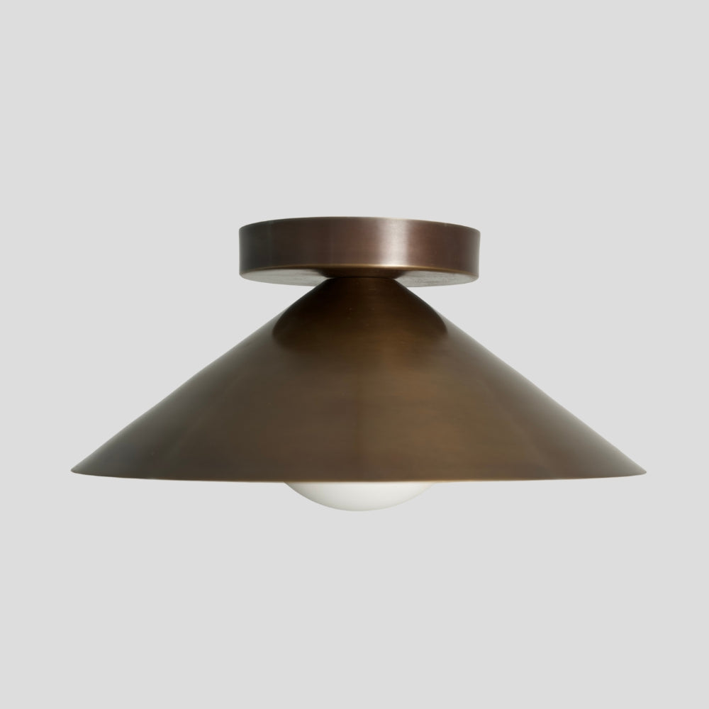 A pure antique brass cone ceiling light designed with a handmade glass globe by Lightco