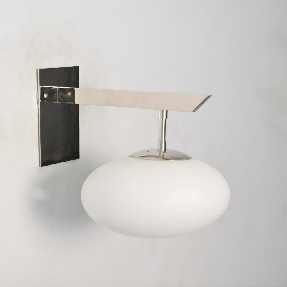 Wall Sconce  light fixture with a milky glass shade on a gray background