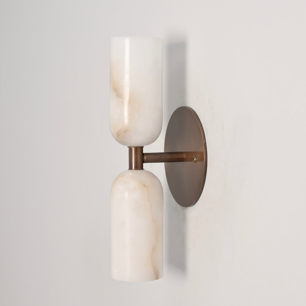 Antique brass wall mounted light with alabaster shade