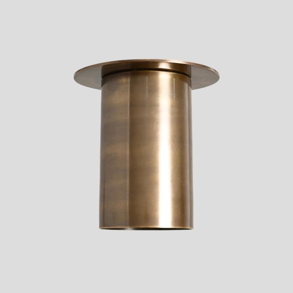 Modern mid century brass cylinder spot light in a pure antique brass finish