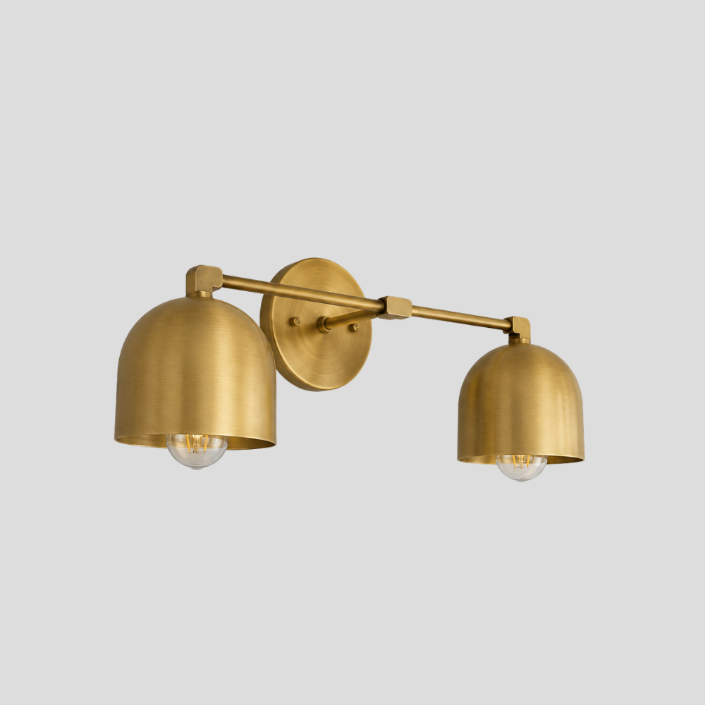 Double Brass Dome Vanity Light - Mid Century Linear Wall Sconce featuring a handmade vanity light with a mid-century linear wall sconce design and two brass shades.