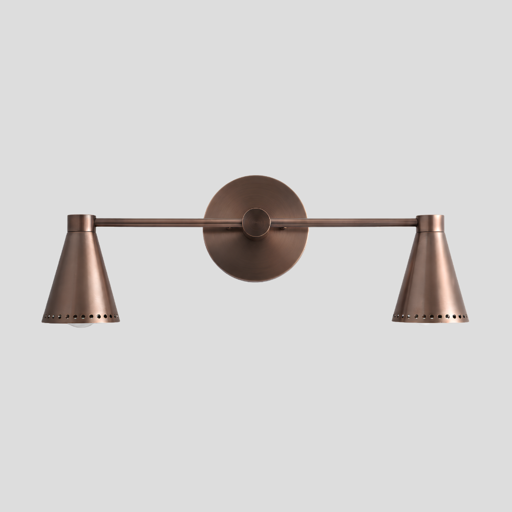 Double Perforated Brass Cone Sconce - Mid Century Vanity Light with horizontal bar arm, dual perforated cone shades, and round wall mount base.