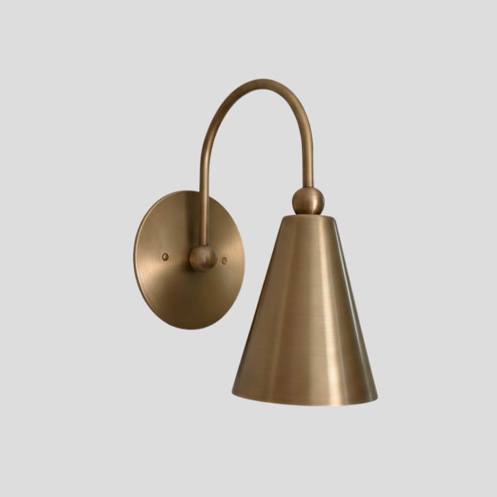 Modern Brass Cone Shade Sconce - Curved Gooseneck Wall Light with arc arm, tapered cone shade, and round wall mount base