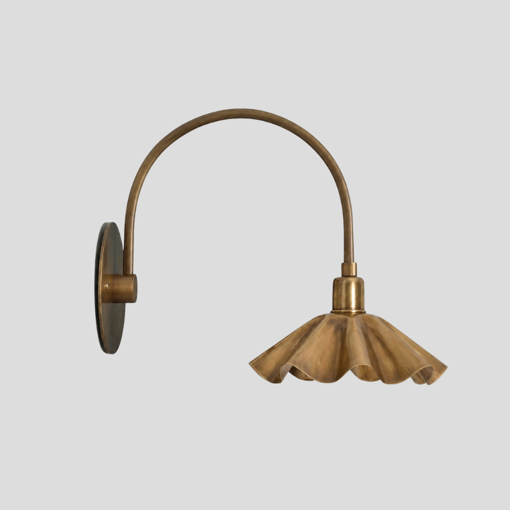 Modern Brass Ruffled Petal Shade Wall Lamp - Curved Flower Gooseneck Sconce with tall arc arm, petal shade, ruffles, and flower-inspired design