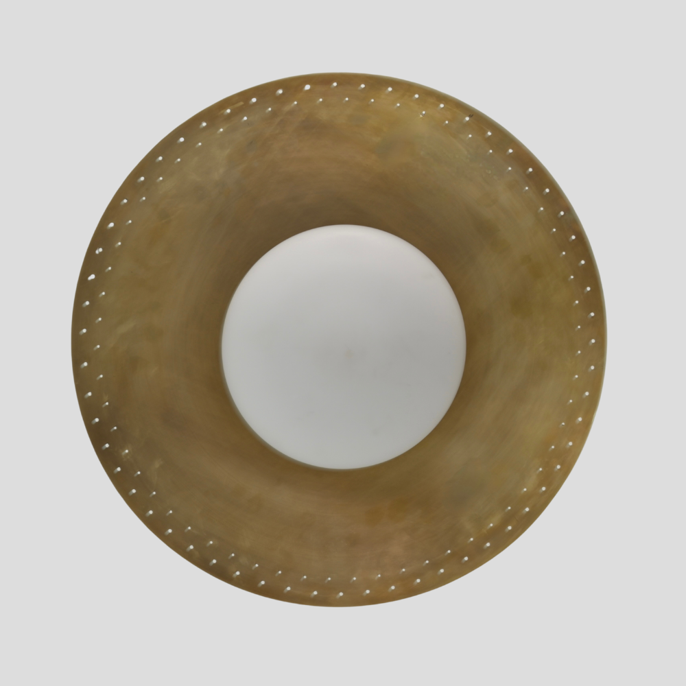 Close-up detail of Perforated Brass Dome Ceiling Light - Glass Globe Pendant showing perforated dome shade in raw brass finish and white glass globe.