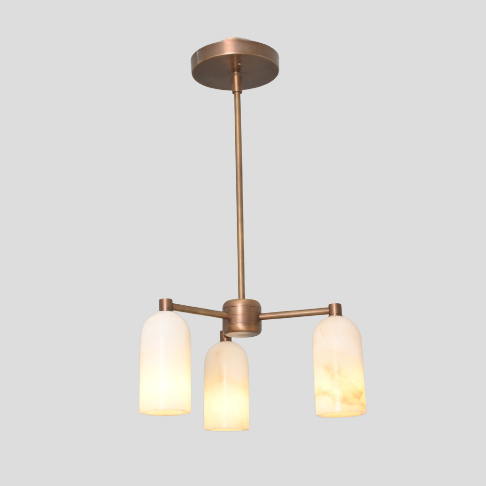 Mid century modern brass pendant light with natural stone shades