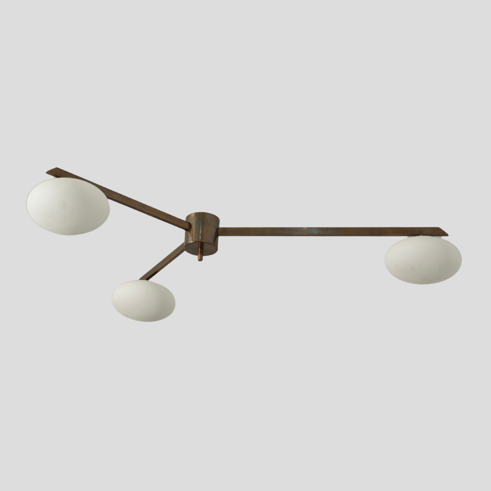 Three brass globe chandelier in a mid century design handcrafted by LightCove 