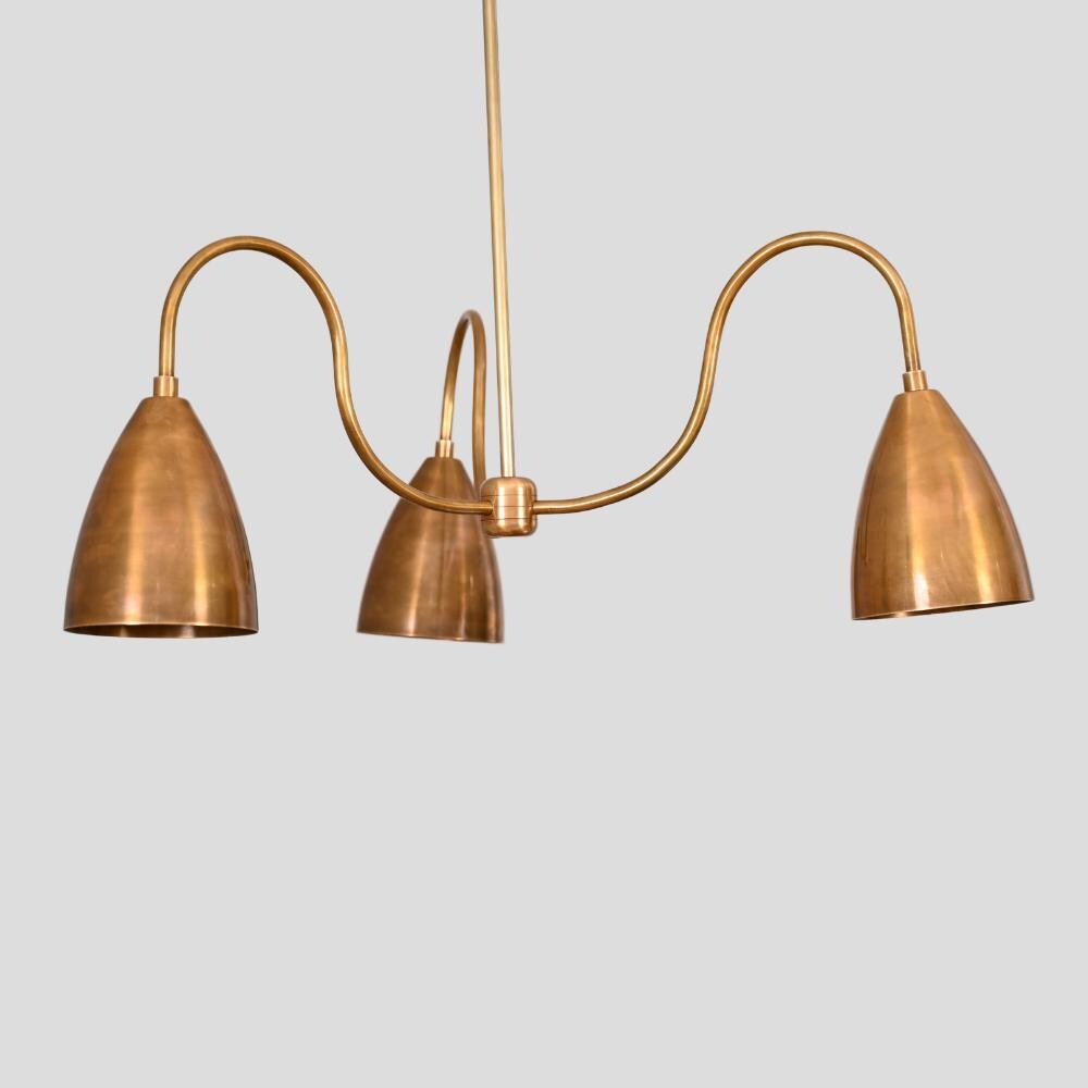 vintage mid century ceiling light inspired by Italian design, with three brass downward shades 