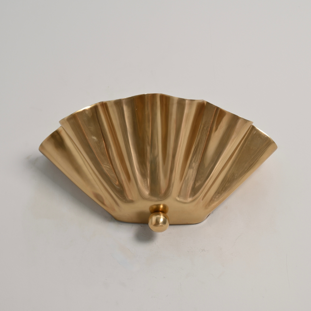 minimalist brass decorative ball on a petal shade wall sconce 