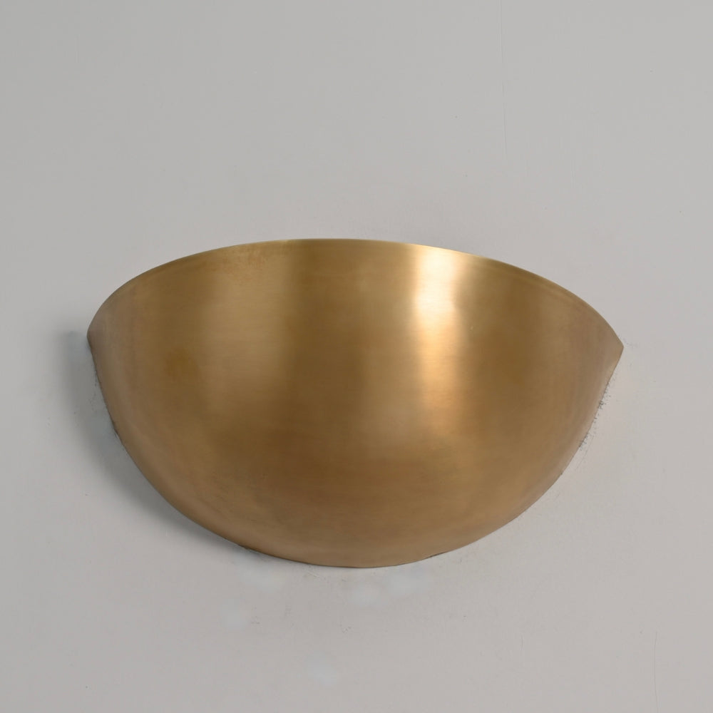 Brass moon shade with a clean curved shade wall sconce 