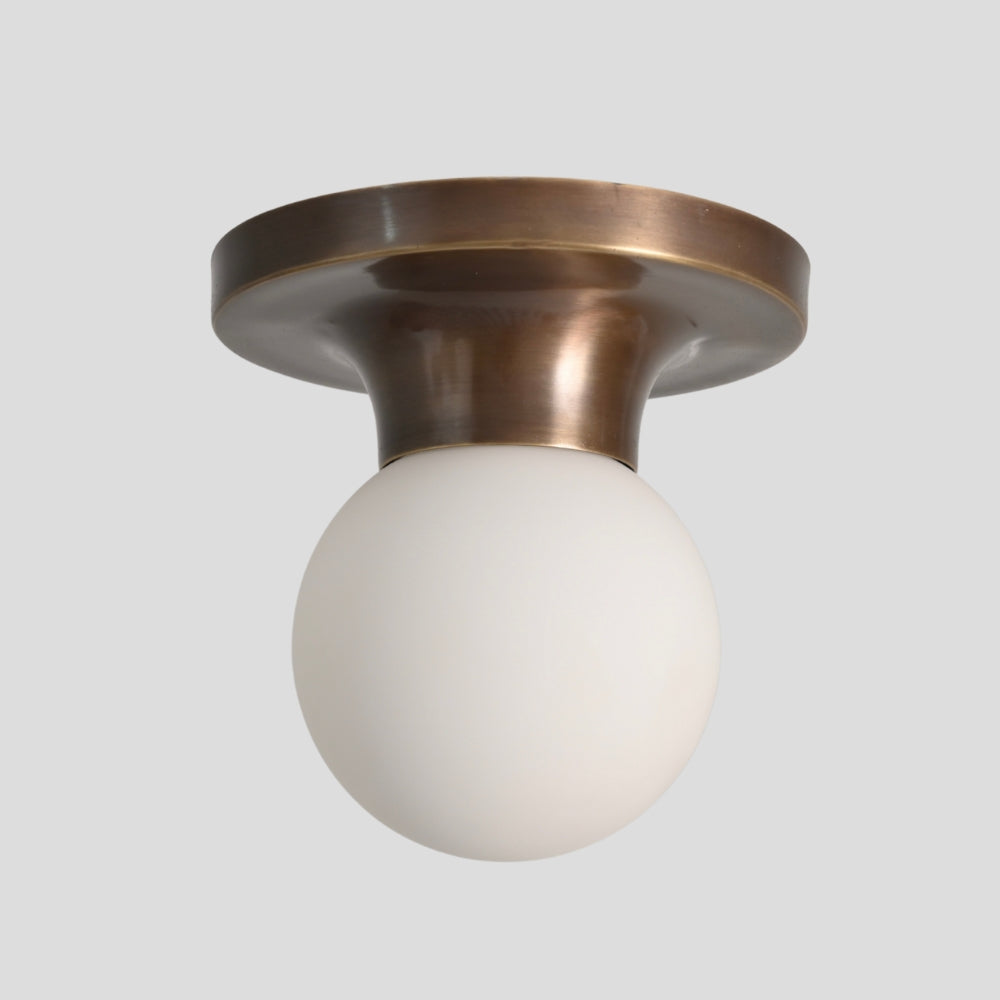 modern small brass flush mount ceiling light with glass globe